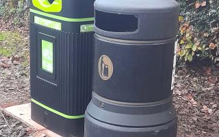 Recycling and non-recycling bins in playpark