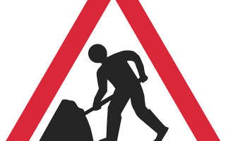 Image of road sign showing man digging